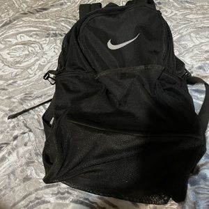Nike mesh black back pack. In good condition